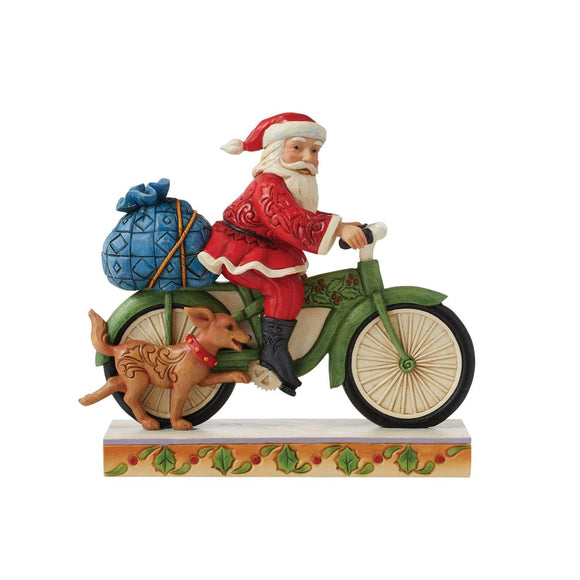 Santa Riding Bicycle Jim Shore